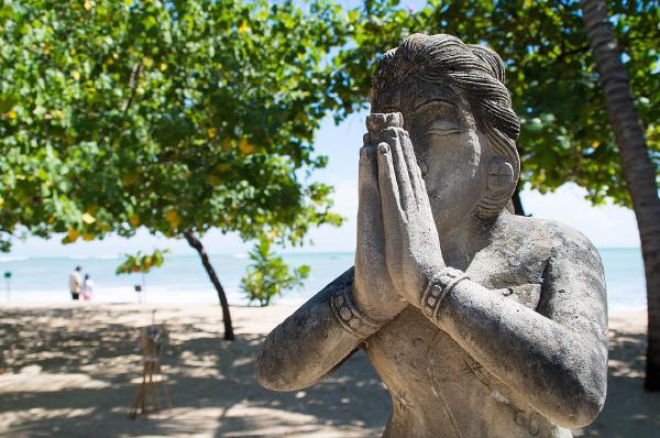 Namaste greeting statue in Bali, Indonesia